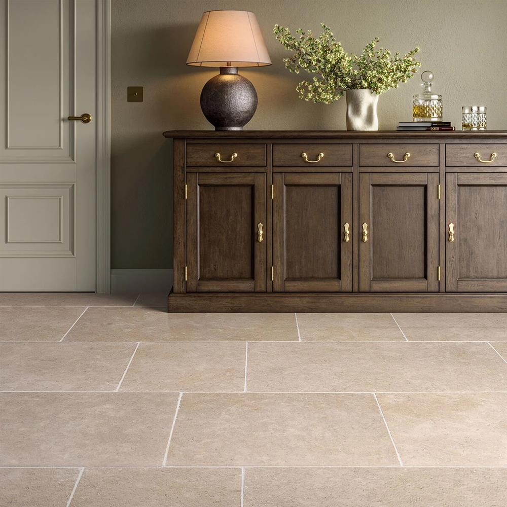 Dijon tumbled limestone tiles with a classic kitchen sideboard